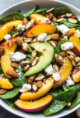 Summer Peach Spinach Salad with Avocado, Toasted Almonds + Goat Cheese