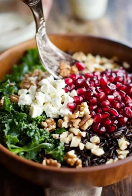 Pomegranate, Kale, and Wild Rice Salad with Walnuts and Feta