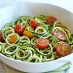 Raw Spiralized Zucchini Noodles with Tomatoes and Pesto
